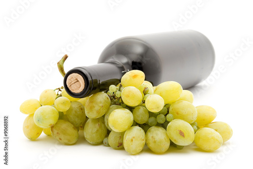 wine and white grapes studio isolated