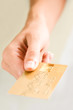 Close-up of female’s hand holding credit card