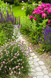 Lush blooming summer garden with paved path Lush blooming summer garden with paved path