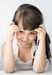 Girl child with bead Girl child with bead
