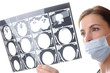 Female doctor examining a x ray