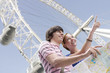 Couple sightseeing with map