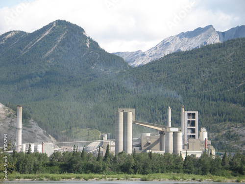 Photo: large factory at the foot of the mountains large factory at the foot of the mountains