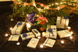 Christmas presents and candles under the tree Christmas presents and candles under the tree
