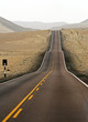 asphalt street in the midle of desert