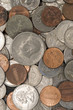 A macro studio shot of a pile of dirty coins.