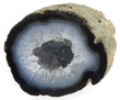 A studio close up shot of a blue agate rock half.