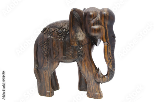 Photo: Wooden elephant isolated on white Wooden elephant isolated on white