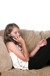 girl on phone in chair