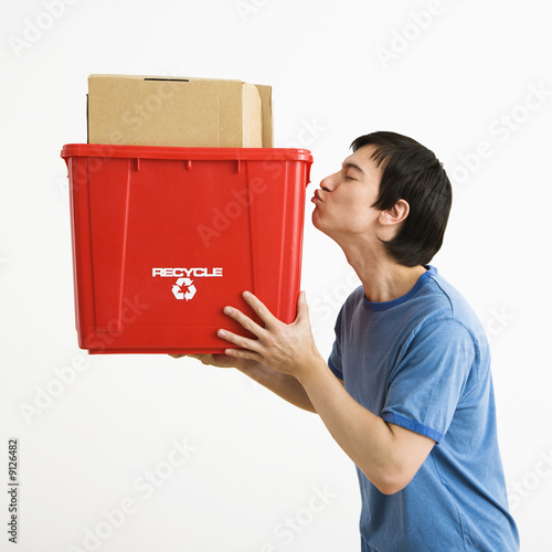 Asian man standing kissing