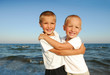Two beautiful brothers embracing each other