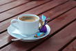 cup of coffee at a wooden table