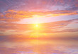 sky and sun reflected in water
