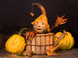 Autumn figurine with pepper hands and gourd face