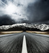 Motion blurred road heading to the Mountains Motion blurred road heading to the Mountains