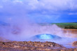 A geyser is born, the gas blows a beautiful bubble of water up