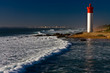 Umhlanga Lighthouse with Durban cityscape as background