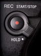 macro of REC button and hold switch on camcorder