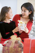 Girl Surprising Her Mother With Christmas Gift