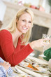 Woman Enjoying Christmas Dinner