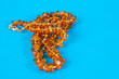 Foto: Amber necklace on blue background Amber necklace on blue background