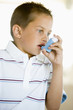Boy Using An Inhaler