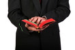 Man in suit holding bible in his hands