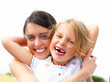 Portrait of a laughing young mother with her daughter
