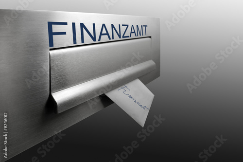 Photo: Envelope in letterbox, close-up Envelope in letterbox, close-up