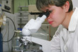 Scientist and microscope