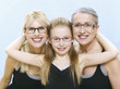 Grandmother, mother and daughter wearing spectacles, portrait
