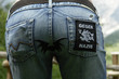 Back view of woman in jeans with Anti Nazi applique