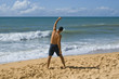 Man shouting for joy on the beach