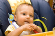 Little baby sitting comfort and eating.