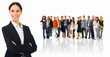 Photo: Smiling young businesswoman in front of a large group Smiling young businesswoman in front of a large group