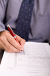 businessman checking or signing contract papers