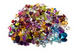 A large group of faceted gemstones on a white background