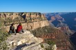 An image of hikers enjoying the view of the Grand Canyon An image of hikers enjoying the view of the Grand Canyon