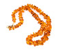 Foto: Amber necklace on blue background Amber necklace on blue background