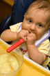 Little baby sitting comfort and eating.