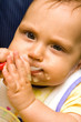 Little baby sitting comfort and eating.