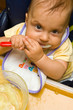 Little baby sitting comfort and eating.