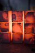 piles of hot iron blocks in foundry. Narrow focus