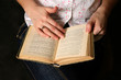 Female hands with the old book Female hands with the old book