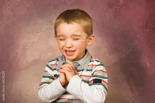 Photo: Young boy with short hair and beautiful facial expressions Young boy with short hair and beautiful facial expressions