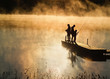 Early morning fishing in autumn on a lake Early morning fishing in autumn on a lake