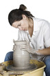 Picture of a potter works a potter's wheel