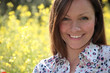 allergy free! pretty young woman on a meadow smiling