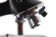 Old microscope isolated on a white background