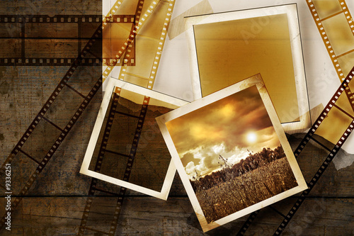 Illustration: Old film and photos on distressed wood background Old film and photos on distressed wood background